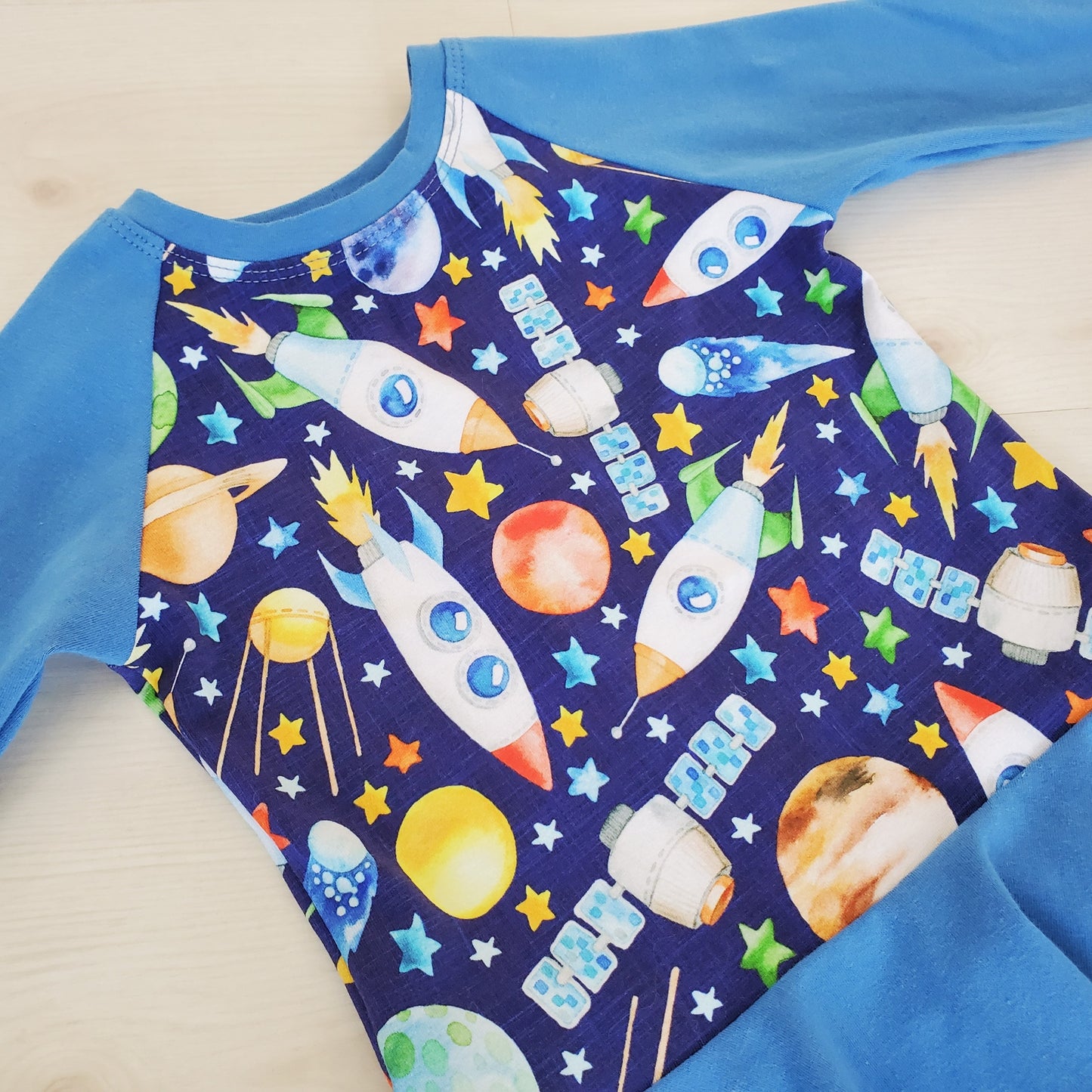 Kid's Organic Peplum Shirt In Space Print